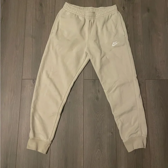 Cream colored nike sweatpants hot sale